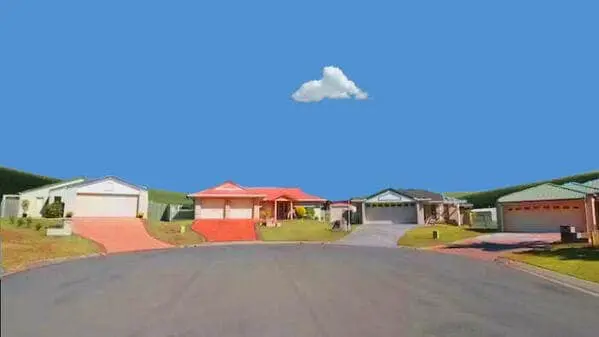 A liminal space creepy suburban street with fake looking houses and a single cloud.