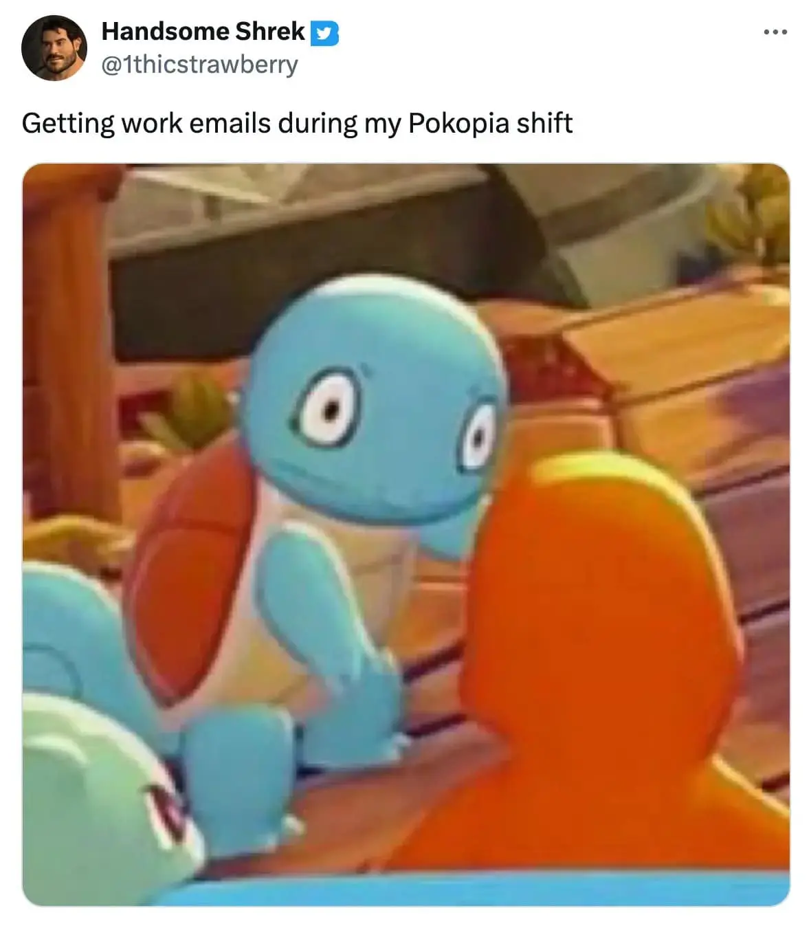 panicked-looking Squirtle from the game's vibrant 3D world stares blankly at the screen. The caption, "Getting work emails during my Pokopia shift," highlights the relatable struggle of balancing real-world responsibilities with this Pokemon Pokopia meme obsession