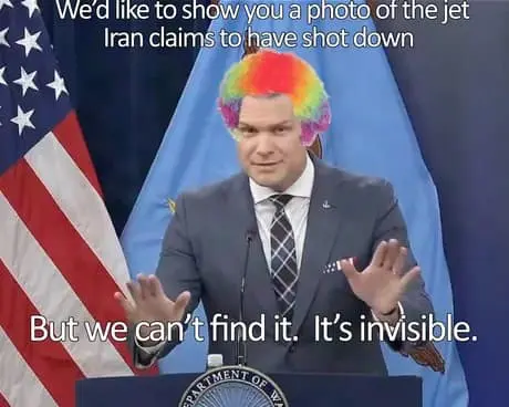 A mock Pentagon briefing Pete Hegseth meme. Hegseth is photoshopped at a podium wearing a bright rainbow clown wig. The text parodies military rhetoric about an "invisible" jet that Iran claims to have shot down but can't be found.