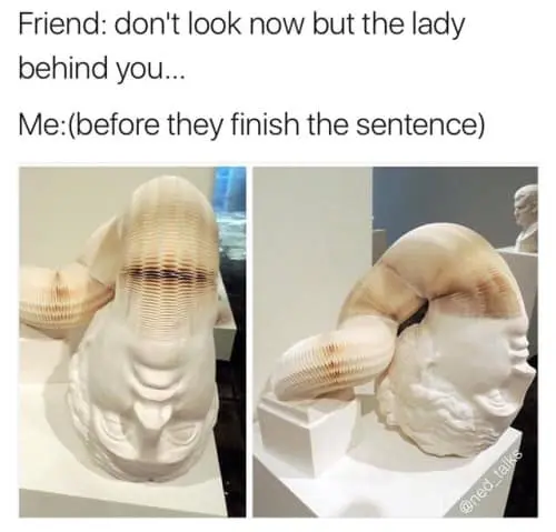 hilarious classic meme showing a marble-like paper sculpture of a head that can be stretched and curved like an accordion. The caption describes the relatable lack of chill when a friend says "don't look now," showing the head arched 180 degrees backwards in a frantic look.