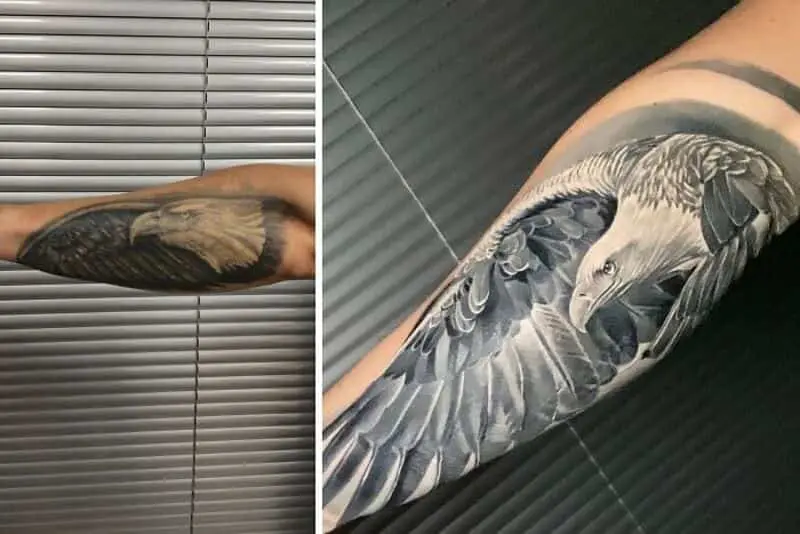 Faded dark bird outline covered by realistic black and grey eagle tattoo coverup on forearm.