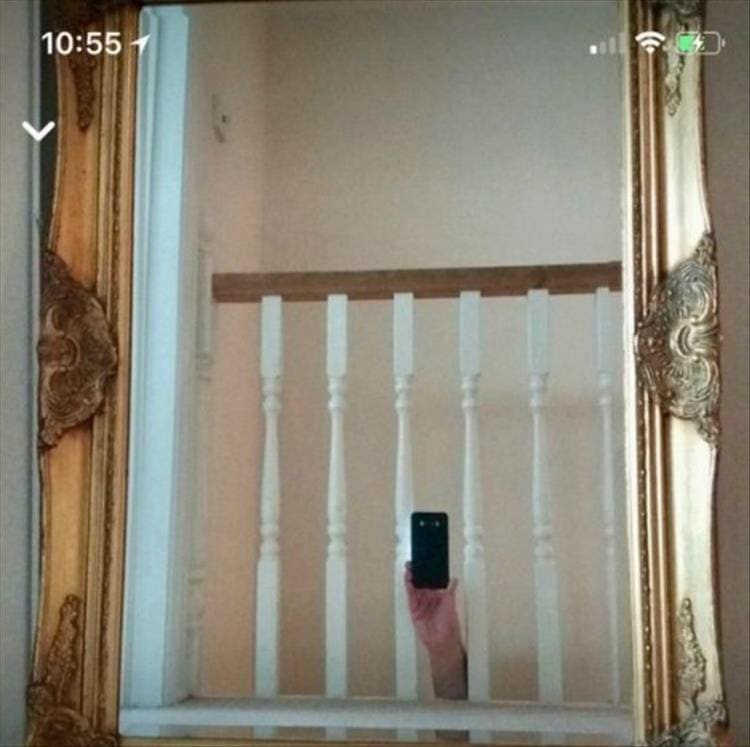 People trying to sell mirrors from from stairs