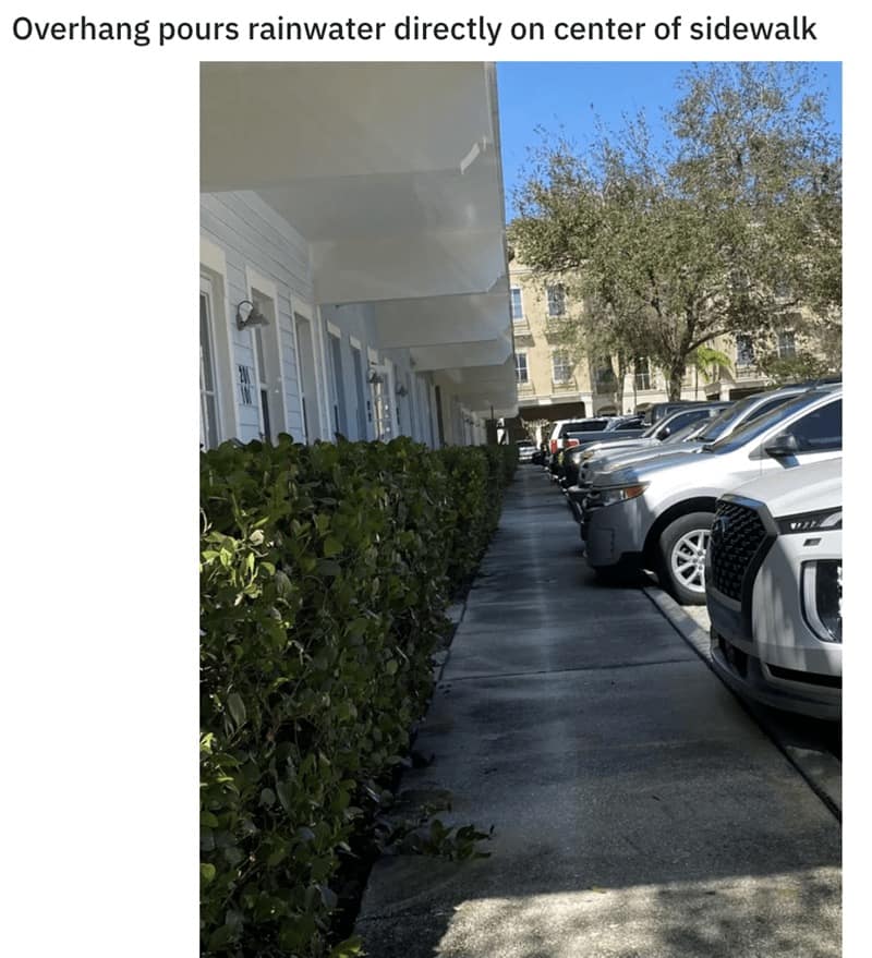 Overhang pours rainwater directly on center of sidewalk