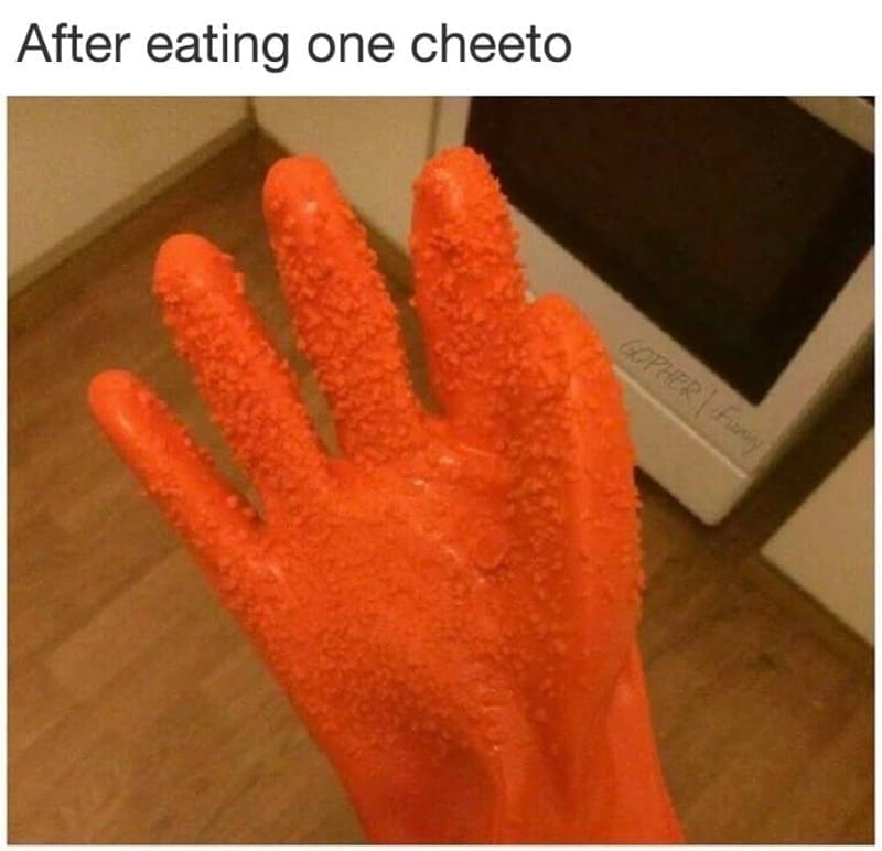 Cheeto Meme Glove covered in orange dust