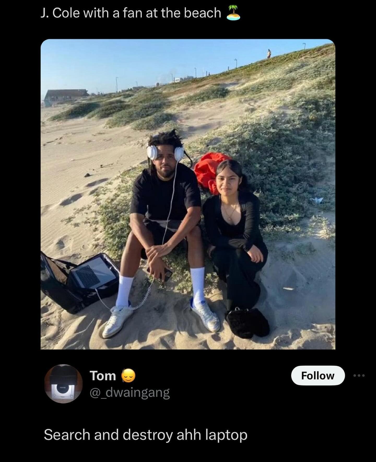 funny pics. J. Cole with a fan at the beach