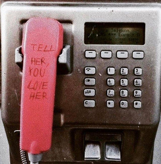 wholesome vandalism, positive graffiti, creative street art, uplifting vandalism, good vibes street art