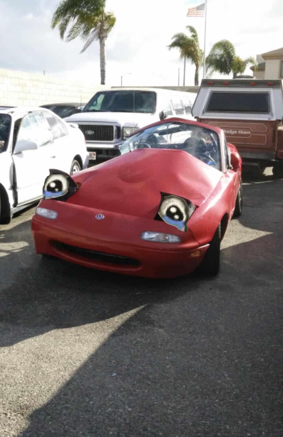 funny miata, miatas with threatening auras, comedic roadster bits, small convertible jokes, quirky sports car humor, Miata memes, comedic two-seater illusions, beloved tiny ride references, Mazda jokes, brand-based comedic angles, automaker witty bits, car humor, vehicular comedic lines, automotive meltdown commentary