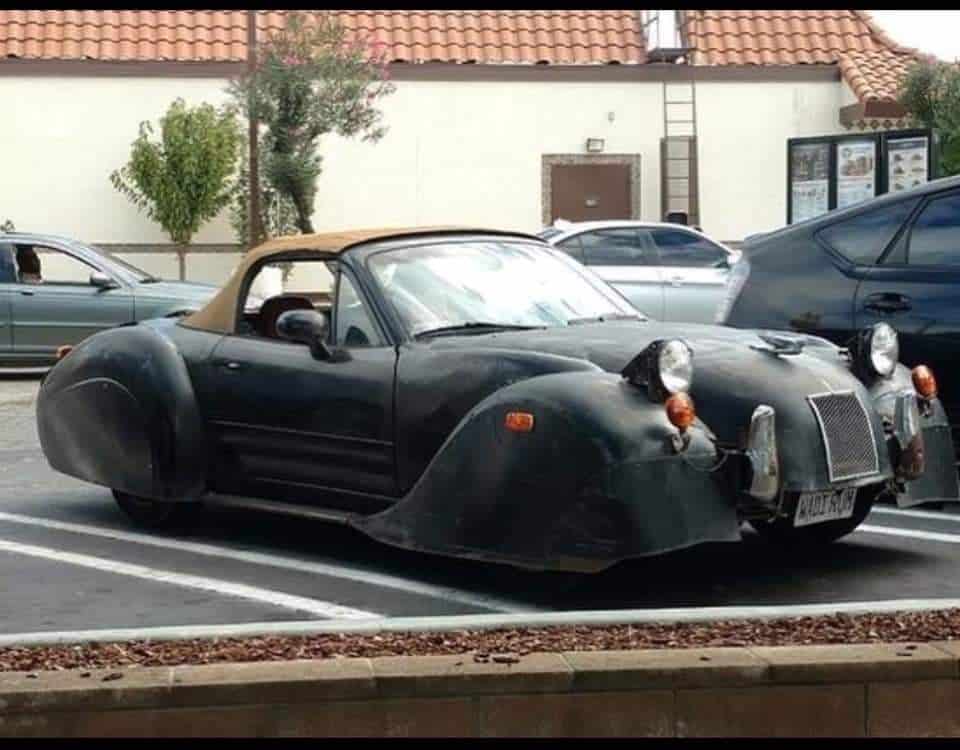 funny miata, miatas with threatening auras, comedic roadster bits, small convertible jokes, quirky sports car humor, Miata memes, comedic two-seater illusions, beloved tiny ride references, Mazda jokes, brand-based comedic angles, automaker witty bits, car humor, vehicular comedic lines, automotive meltdown commentary