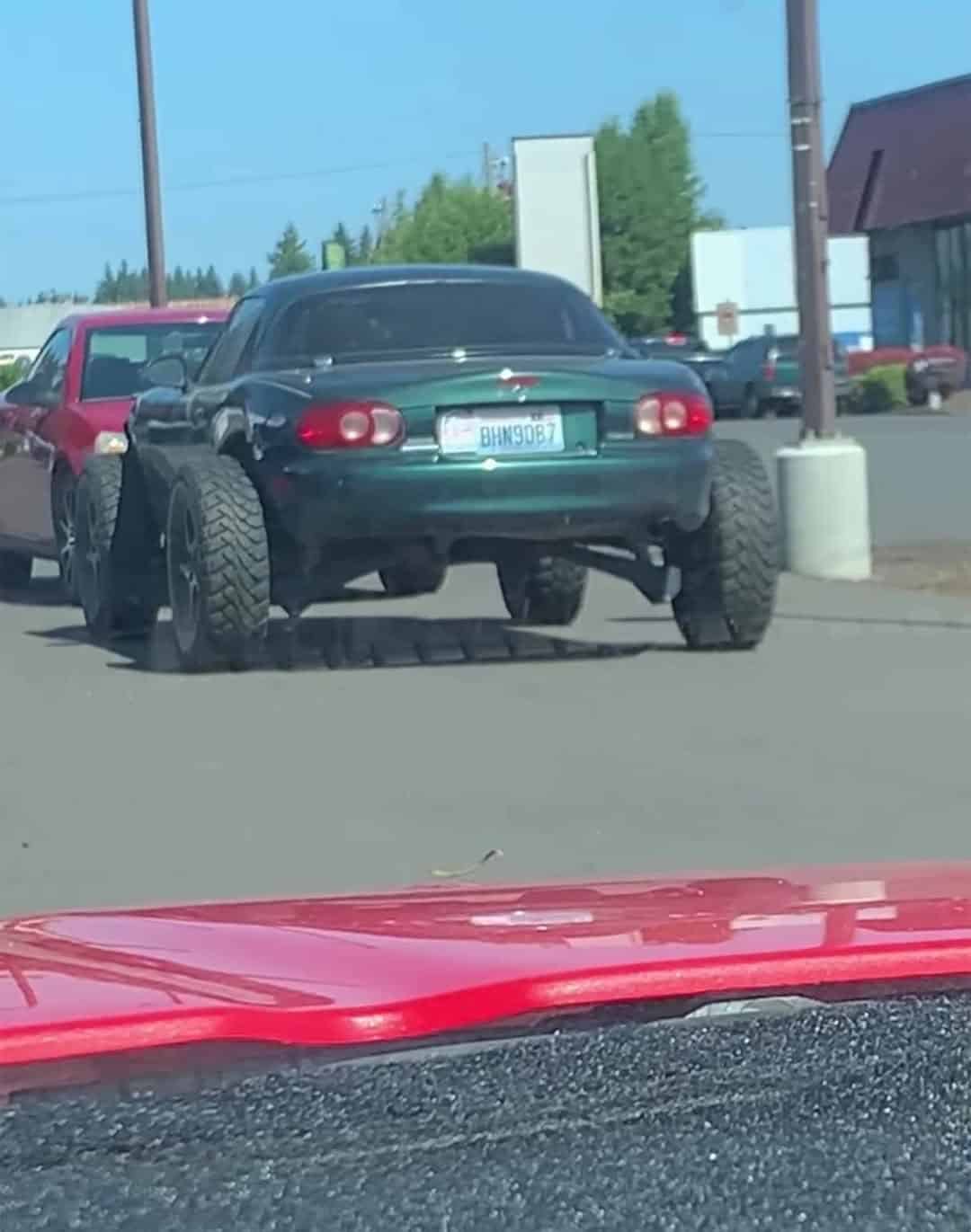 funny miata, miatas with threatening auras, comedic roadster bits, small convertible jokes, quirky sports car humor, Miata memes, comedic two-seater illusions, beloved tiny ride references, Mazda jokes, brand-based comedic angles, automaker witty bits, car humor, vehicular comedic lines, automotive meltdown commentary