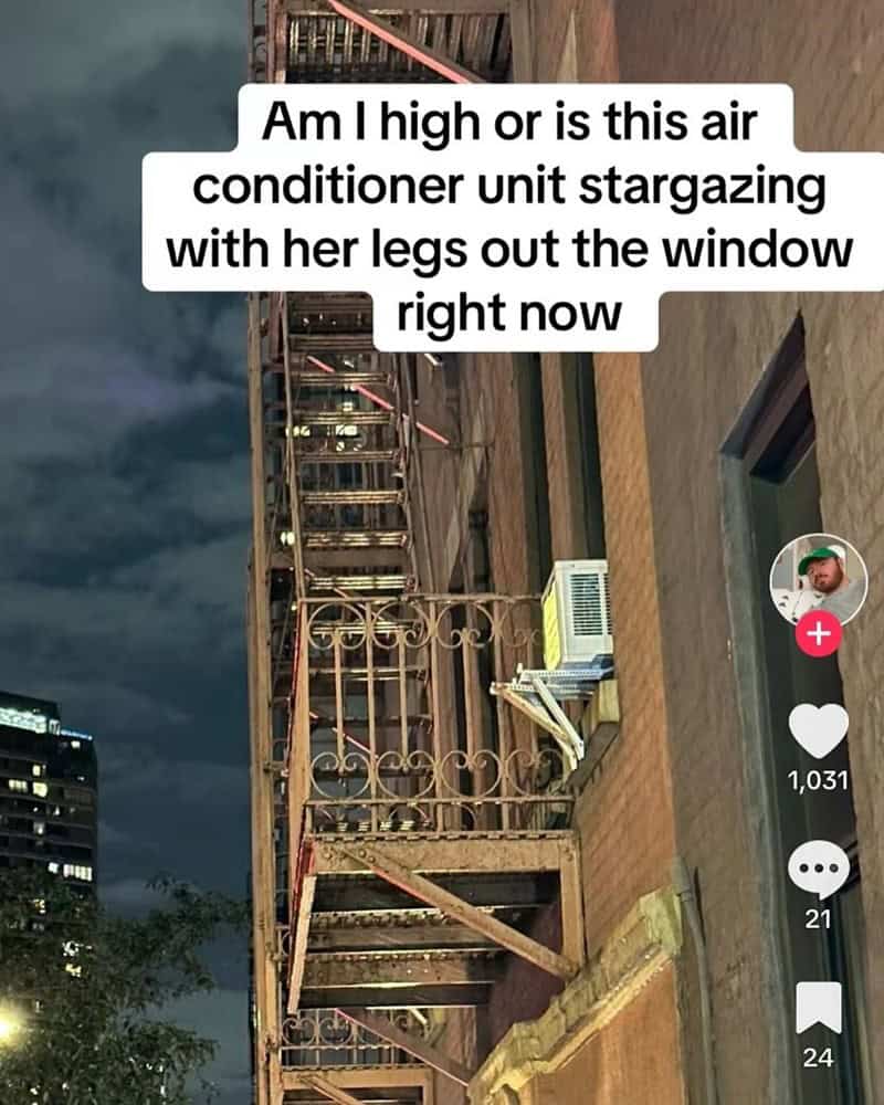 Am I high or is this air conditioner unit stargazing with her legs out the window right now