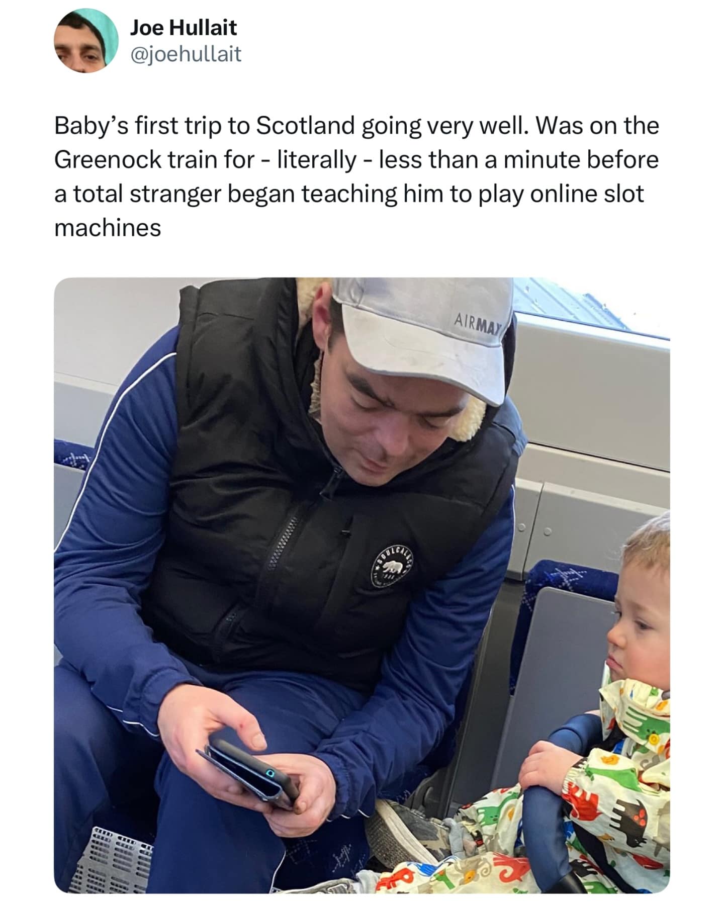 Baby's first trip to Scotland going very well. Was on the Greenock train for - literally - less than a minute before a total stranger began teaching him to play online slot machines