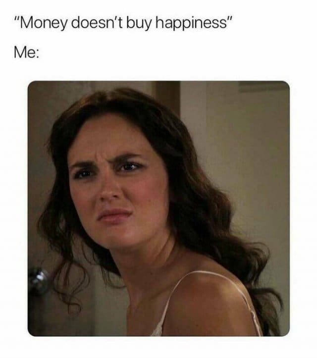 A confused-looking woman reacting to the phrase “Money doesn’t buy happiness.”