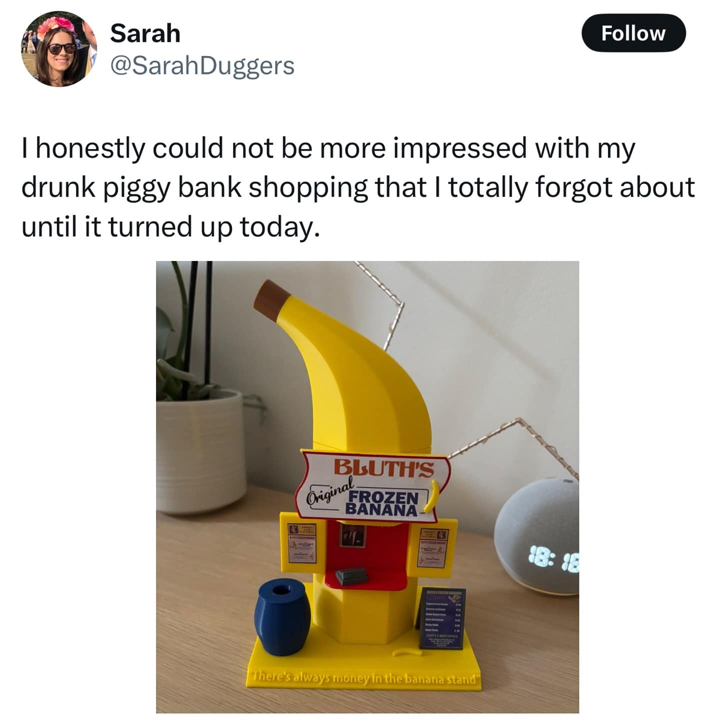 Banana-shaped piggy bank modeled after Bluth’s Frozen Banana stand.