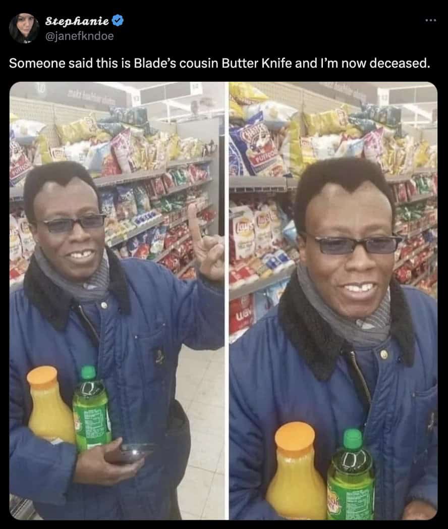 Man in a blue jacket holding orange juice and soda in a grocery store aisle with humorous comment about looking like Blade’s cousin.