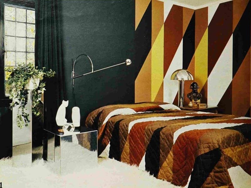 1970s geometric bedroom with bold wall patterns and shag carpet