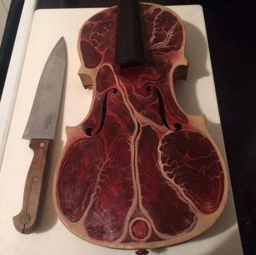 Violin carved to look like raw marbled meat