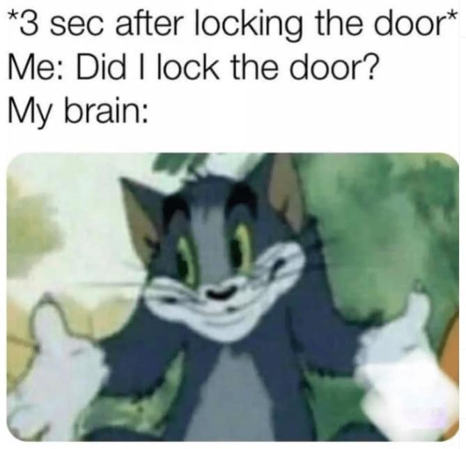 Tom the cat shrugs with palms up in confused expression.