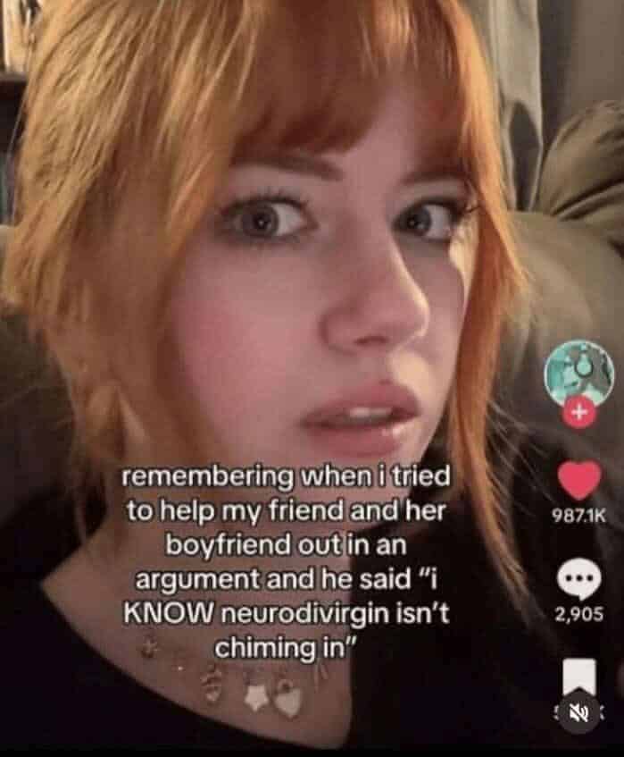 Close-up selfie of a red-haired woman looking startled, with a TikTok-style caption about being called “neurodivirgin.”