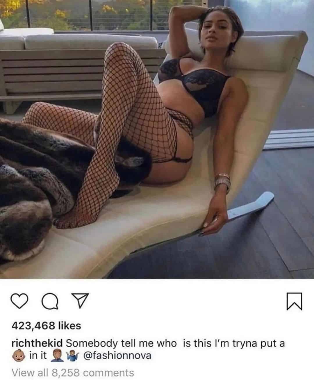 Woman posing in lingerie and fishnet tights