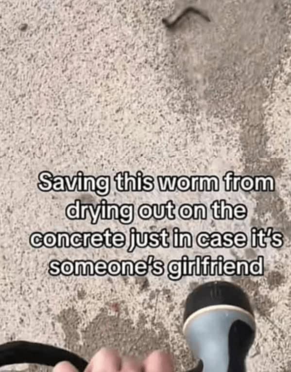 saving this worm from drying out on the concrete just in case it's someone's girlfriend