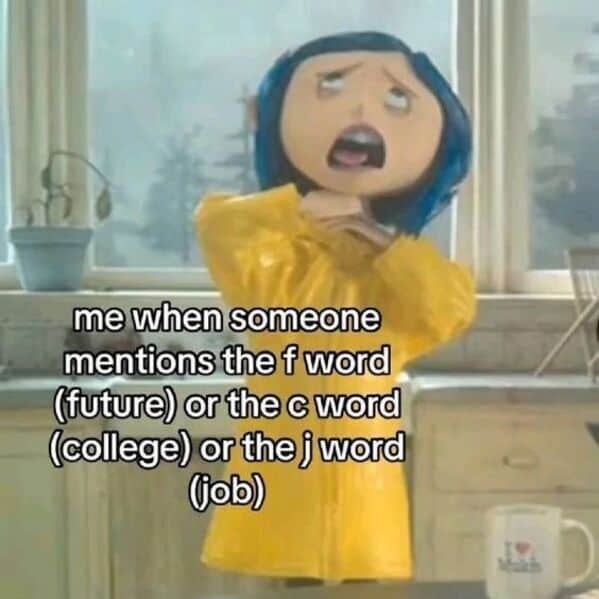 A Coraline doll replica clutches her chest dramatically in a kitchen with the caption: “me when someone mentions the f word (future) or the c word (college) or the j word (job).”