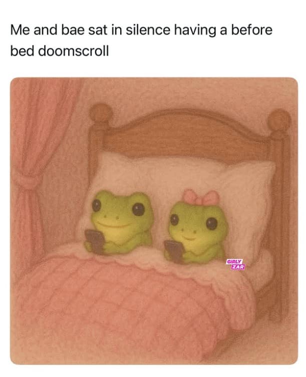 A cute struggle meme showing two frogs doomscrolling on their phones in bed together.