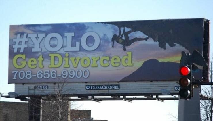 One of the worst ads, a bizarre billboard from a divorce lawyer that says "#YOLO Get Divorced."
