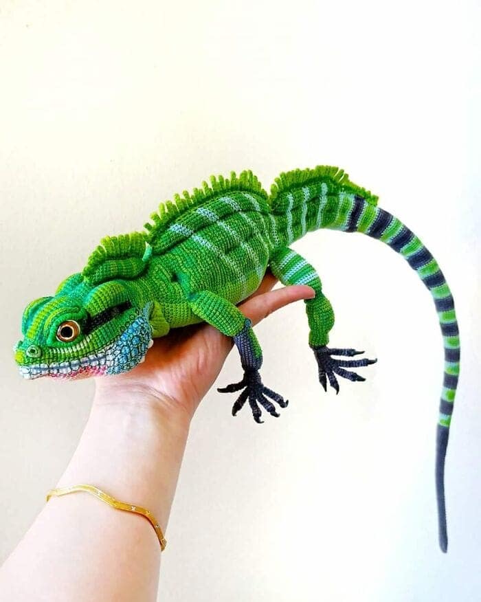 An amazing crochet creation of a stunningly realistic and detailed green iguana.