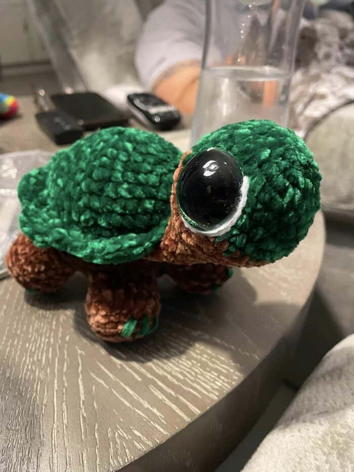 An amazing crochet creation of a cute sea turtle made with soft velvet yarn.