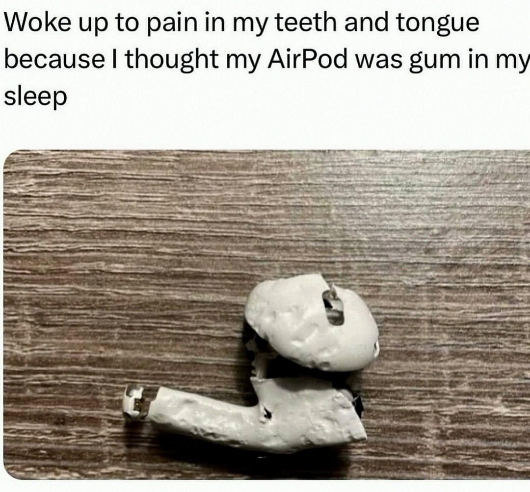 A funny and painful photo of a completely mangled and destroyed Apple AirPod that the user accidentally chewed in their sleep because they thought it was a piece of gum.