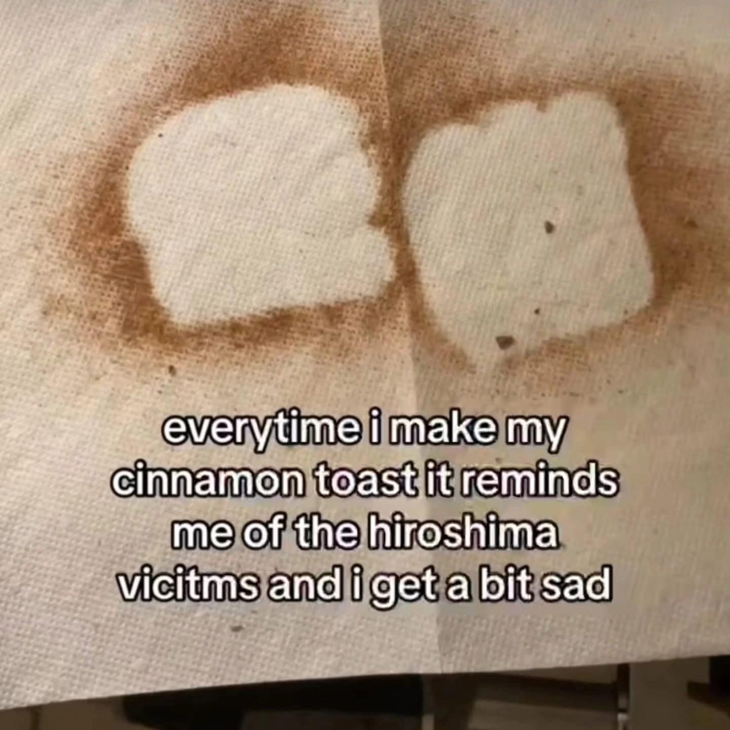 Cinnamon toast residue on a paper towel that unintentionally resembles the shadows left by victims in Hiroshima.