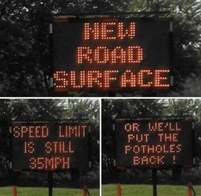A funny sign from a road work crew on a digital display, threatening to put the potholes back if people speed.