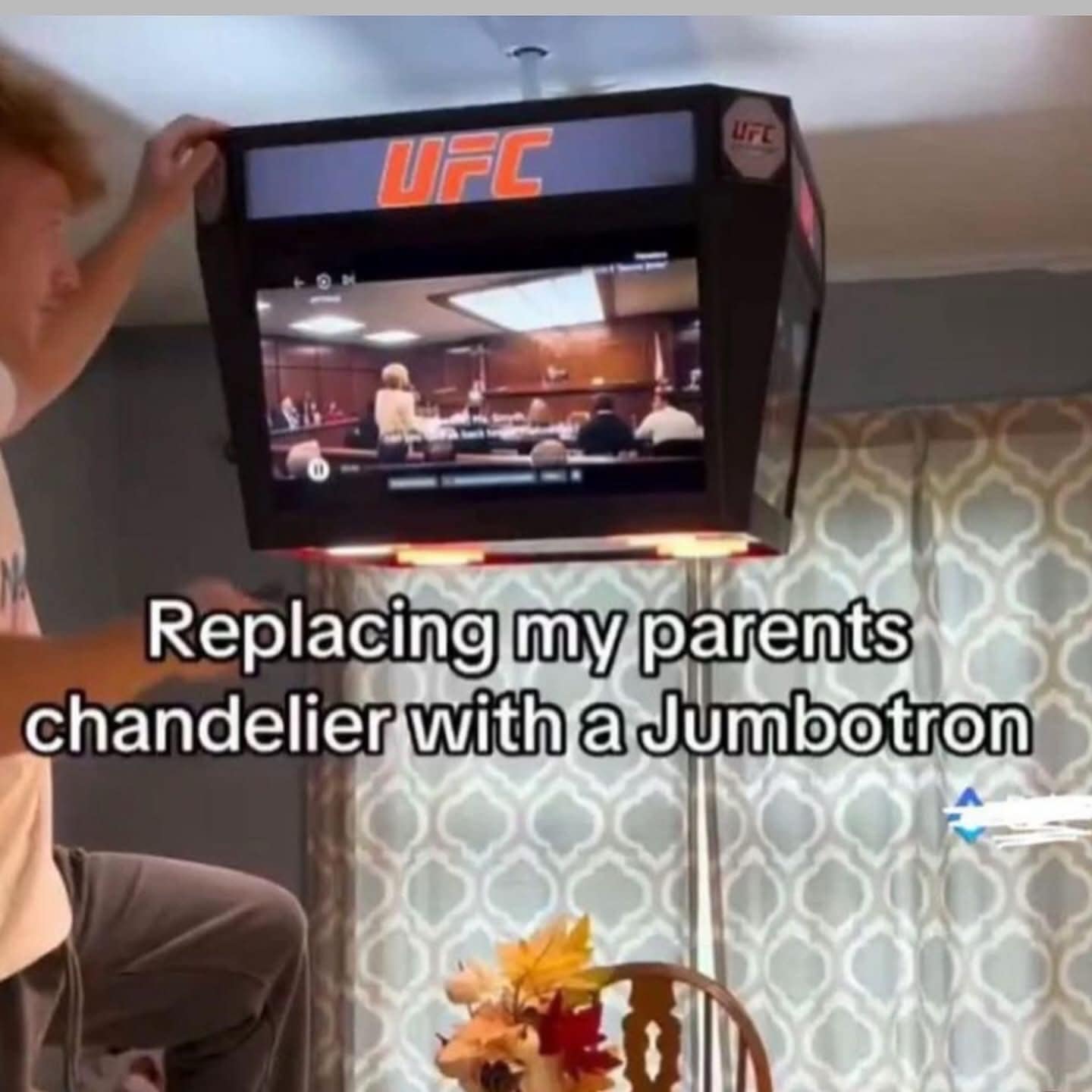 A hilarious meme of a son replacing his parents' dining room chandelier with a UFC Jumbotron.