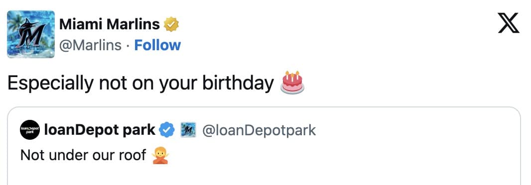 Reply from the Miami Marlins account—“Especially not on your birthday 🎂”—quoting loanDepot park’s “Not under our roof” message.