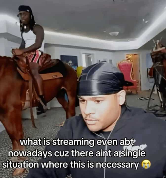 A funny screenshot from a chaotic TikTok stream where a man is inexplicably riding a horse in the background of another streamer's room.