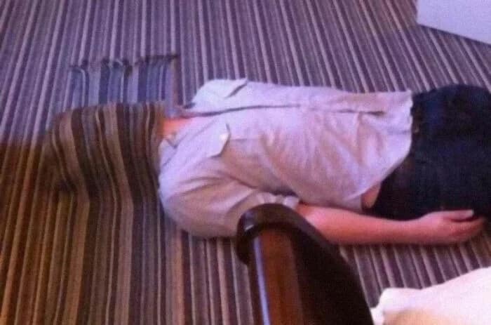 This glitch in the matrix example features a man whose striped shirt achieves accidental camouflage with the carpet