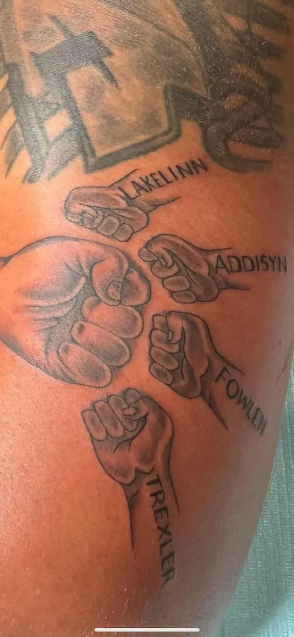 A tattoo of family fist bumps with the uniquely spelled, weird names "Lakelinn," "Addisyn," "Fowlen," and "Trexler."