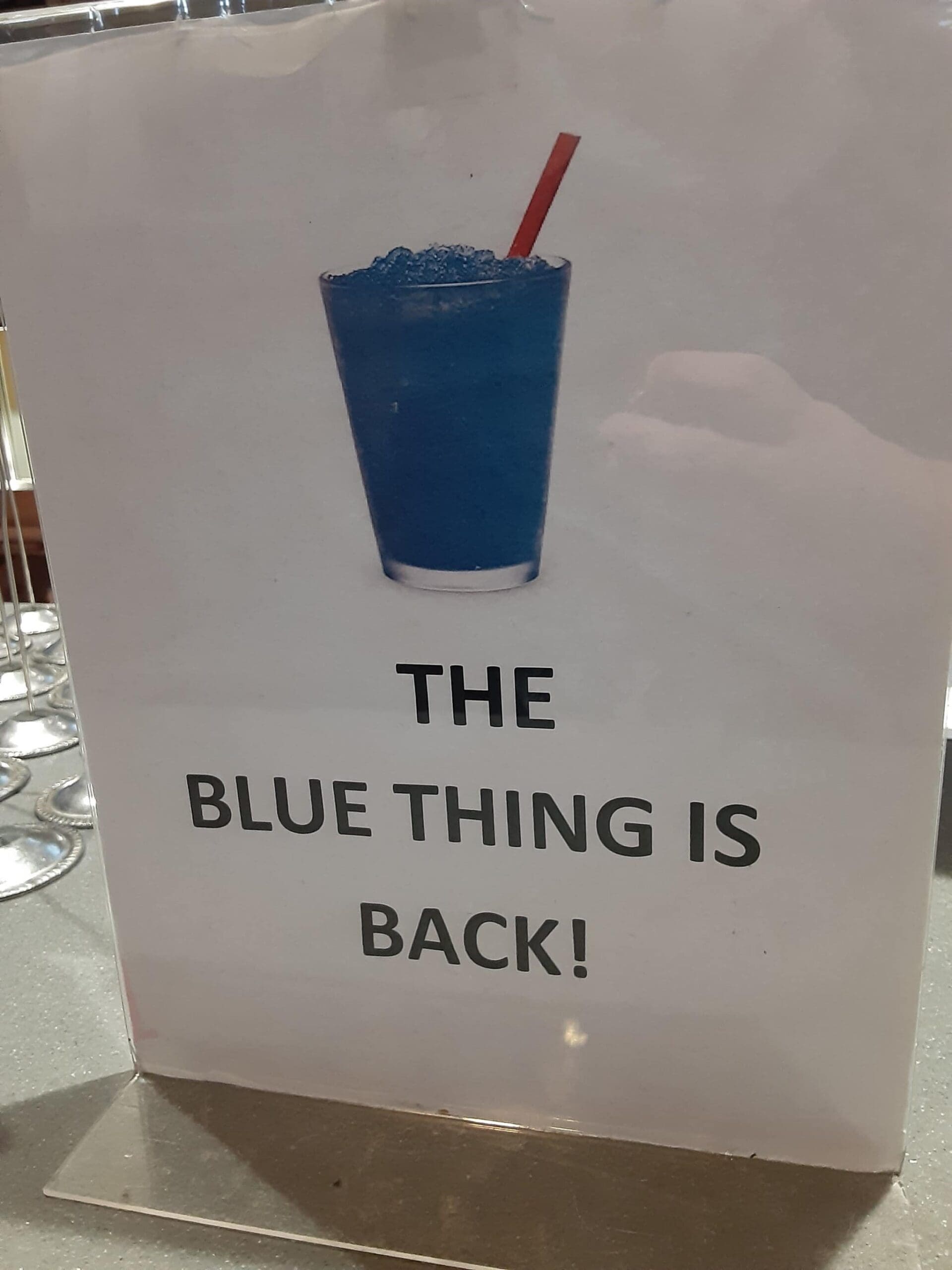 A classic meme of a sign for a blue drink reading "THE BLUE THING IS BACK!"