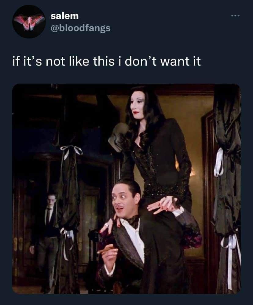 A classic meme of Morticia and Gomez Addams as the ultimate relationship goals.