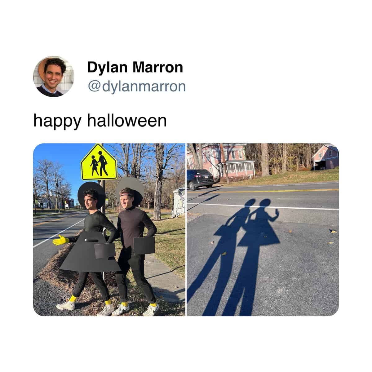 Two people wearing clever DIY costumes resembling the figures on a pedestrian crossing sign.