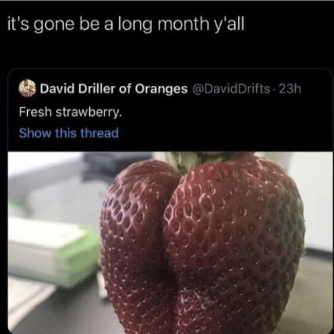 A funny meme of a fresh strawberry that is shaped suggestively like a human butt.