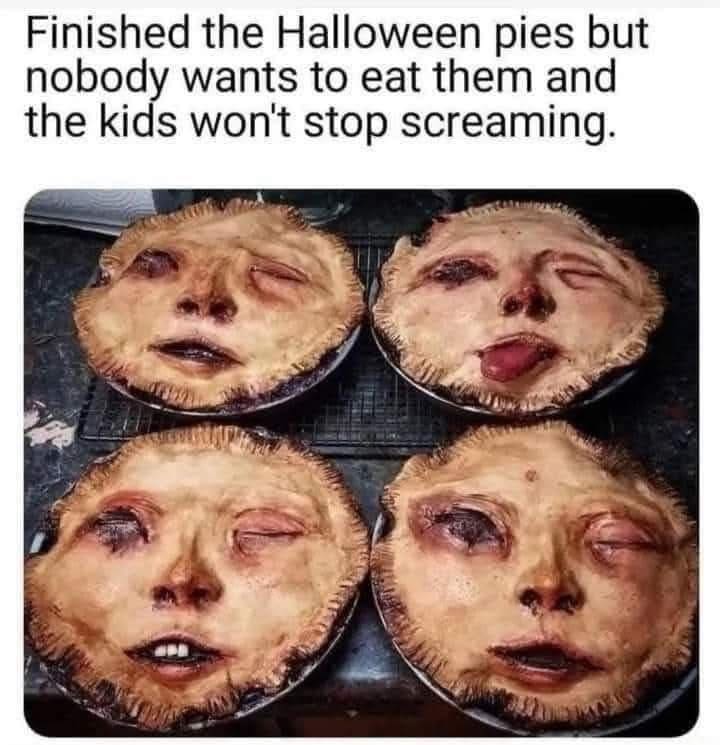 Funny memes image of four terrifying Halloween pies baked to look like grotesque severed human faces.