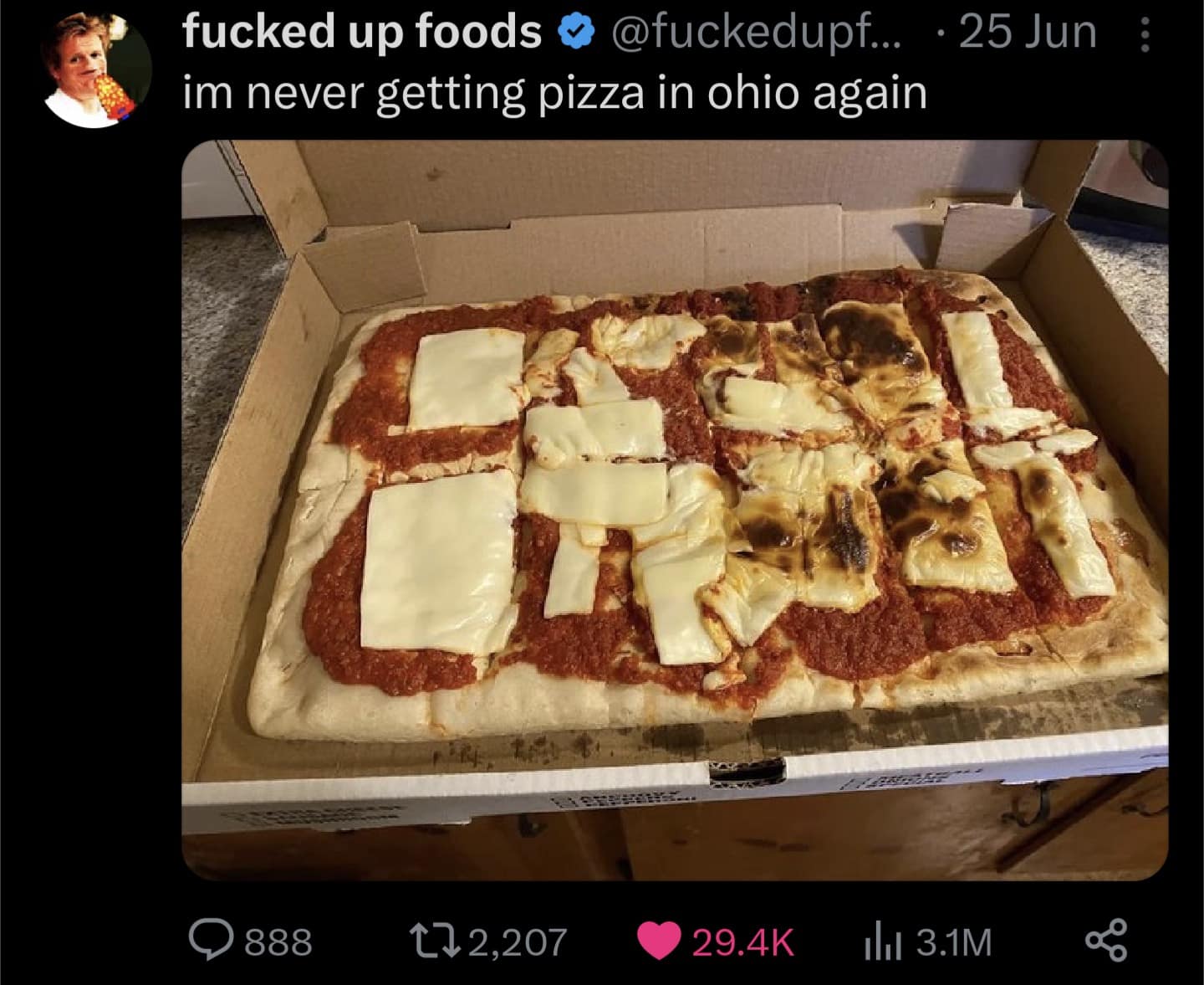 Funny meme screenshot of a disgusting-looking pizza from Ohio with unmelted cheese slices in a box.
