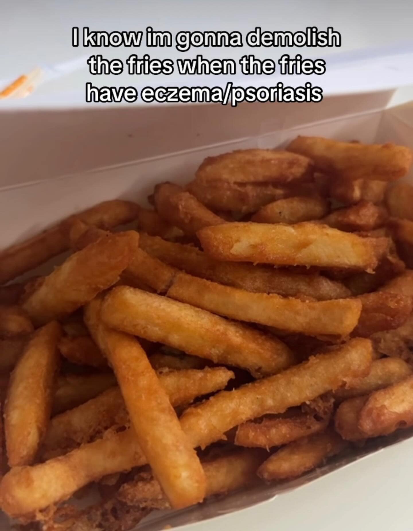 Funny memes food post comparing crispy, flaky french fries to having eczema or psoriasis.