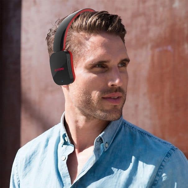 A funny photoshop fail in a product photo where headphones are floating near the model's head, not on his ears