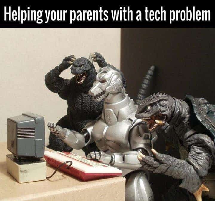Funny sci fi meme showing Godzilla, Mechagodzilla, and Gamera struggling with a tiny computer, representing tech support