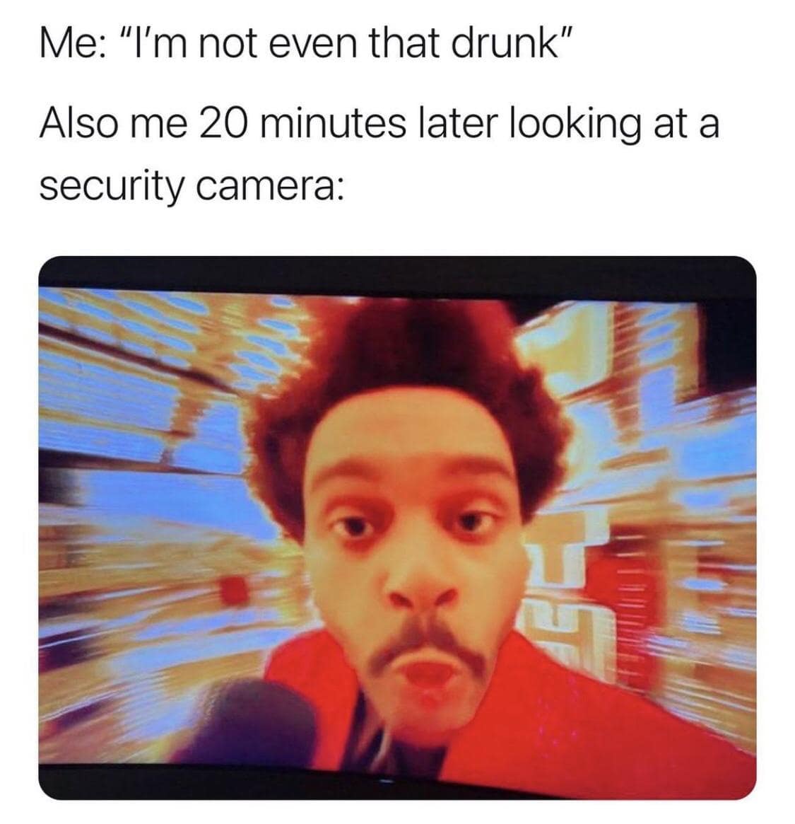 A funny meme using a shot from The Weeknd's Super Bowl halftime show to represent being drunk and looking at a security camera.
