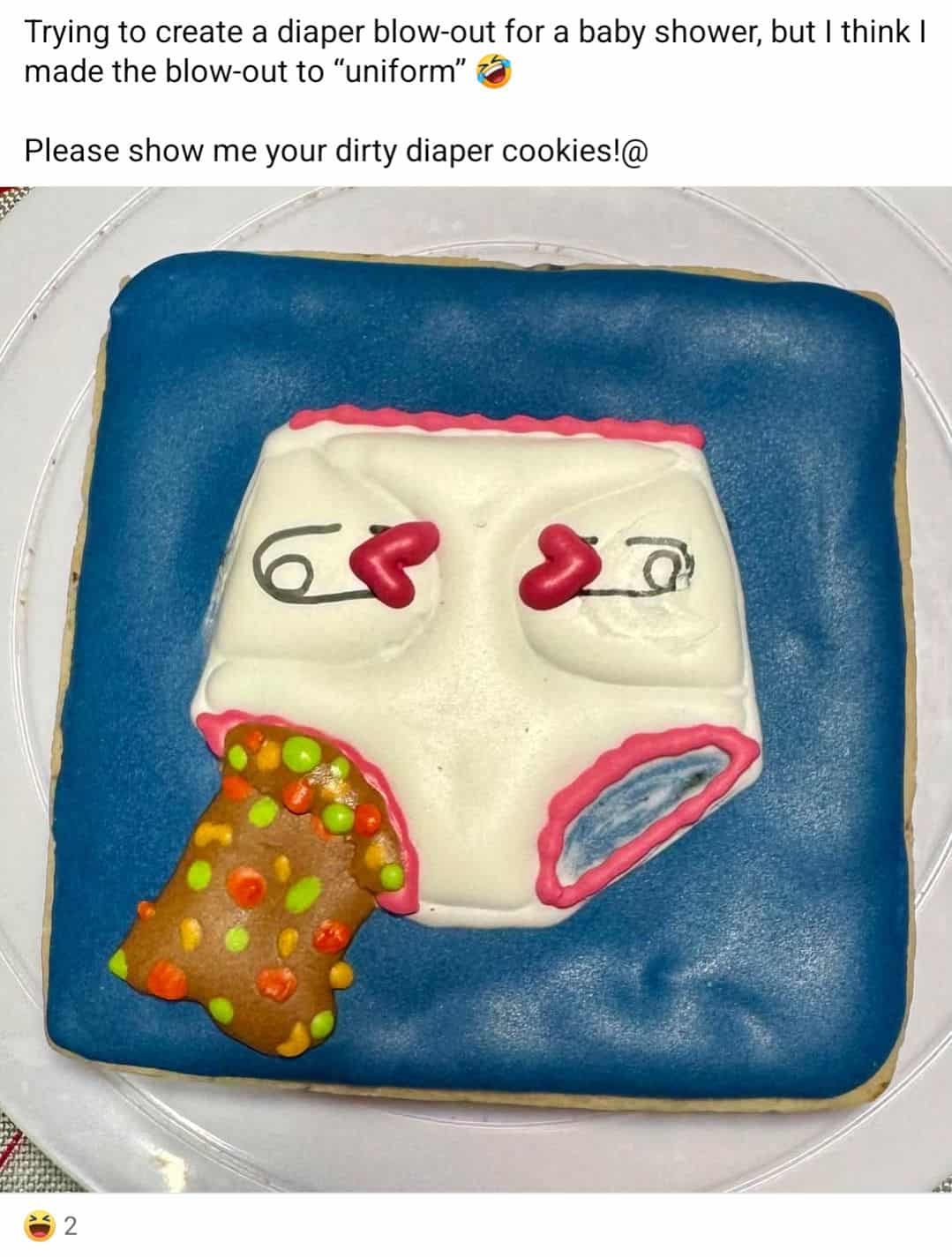 A "diaper blow-out" cookie for a baby shower that looks unappetizingly "uniform" and gross.