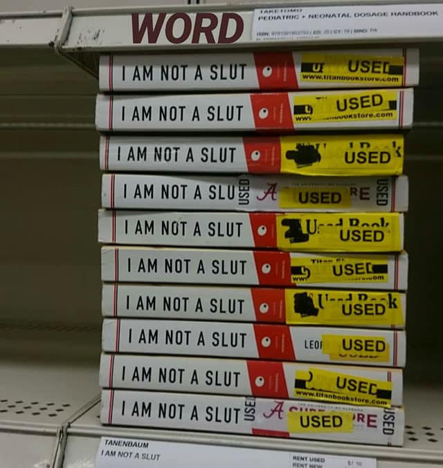 Funny, ironic picture of a stack of "USED" textbooks, all with the title "I AM NOT A SLUT."
