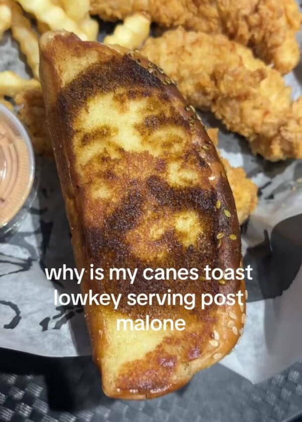 Funny pic of a piece of Raising Cane's toast with burn marks that look like Post Malone's face.